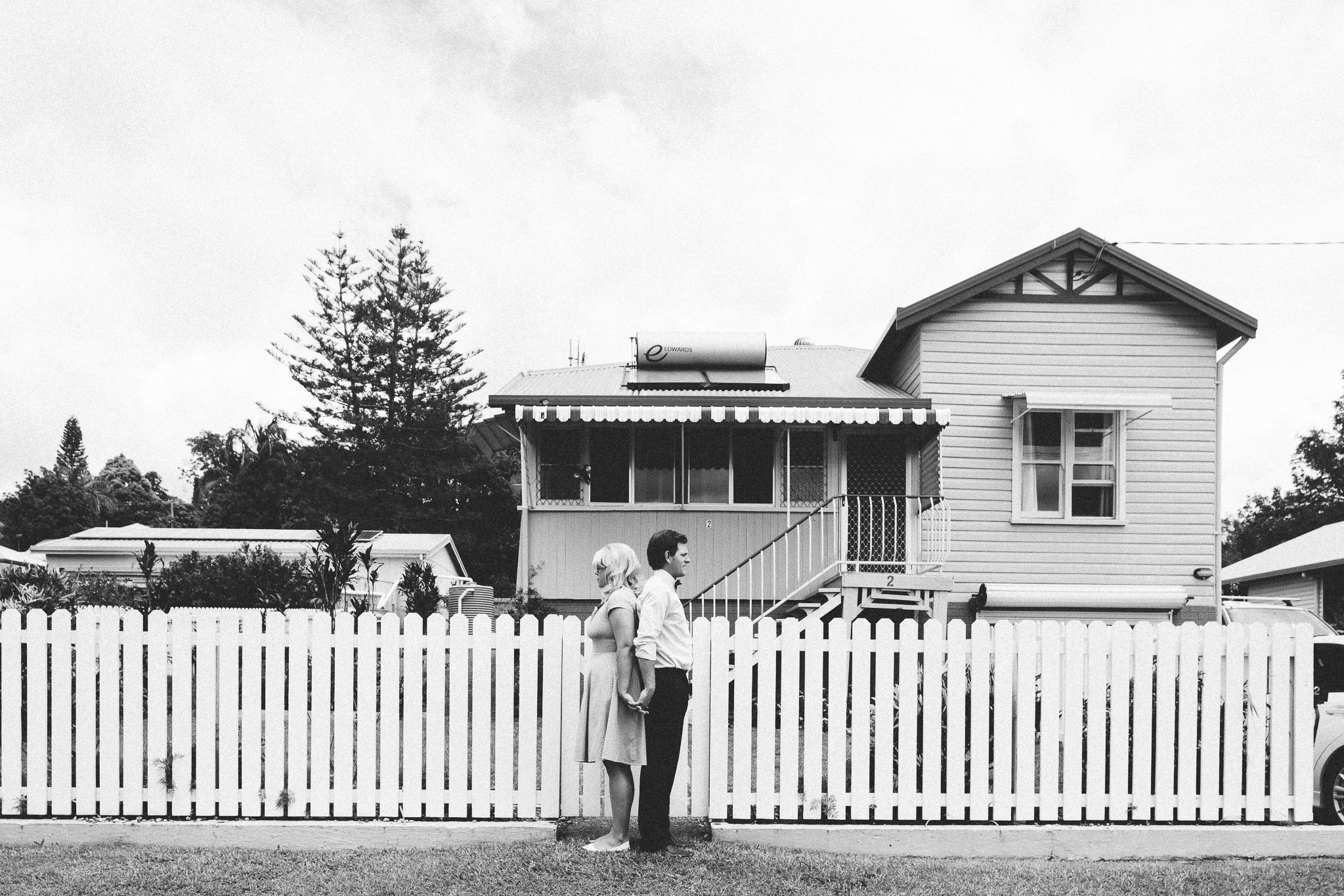 engagement photos in front of the house