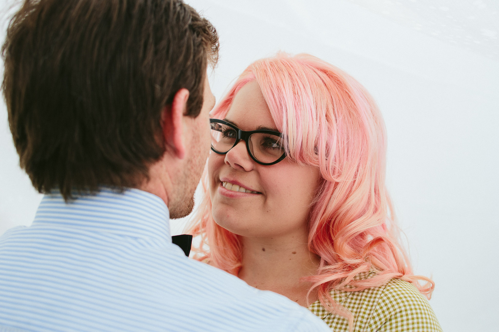 engagement photos couple in sheets