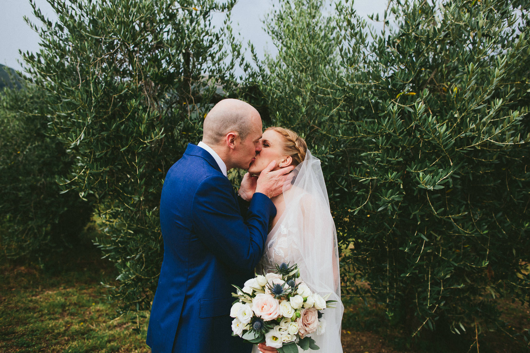 Perugia Italy wedding bride and groom kiss