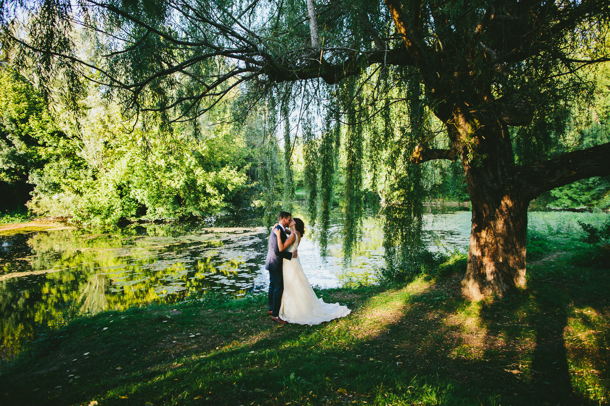 American destination wedding in France willow tree kiss