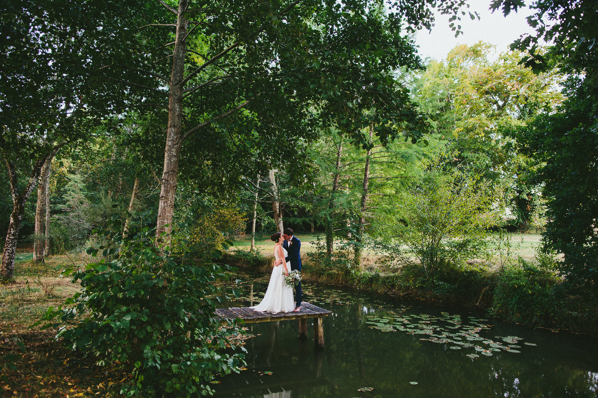 French British wedding woodland kiss
