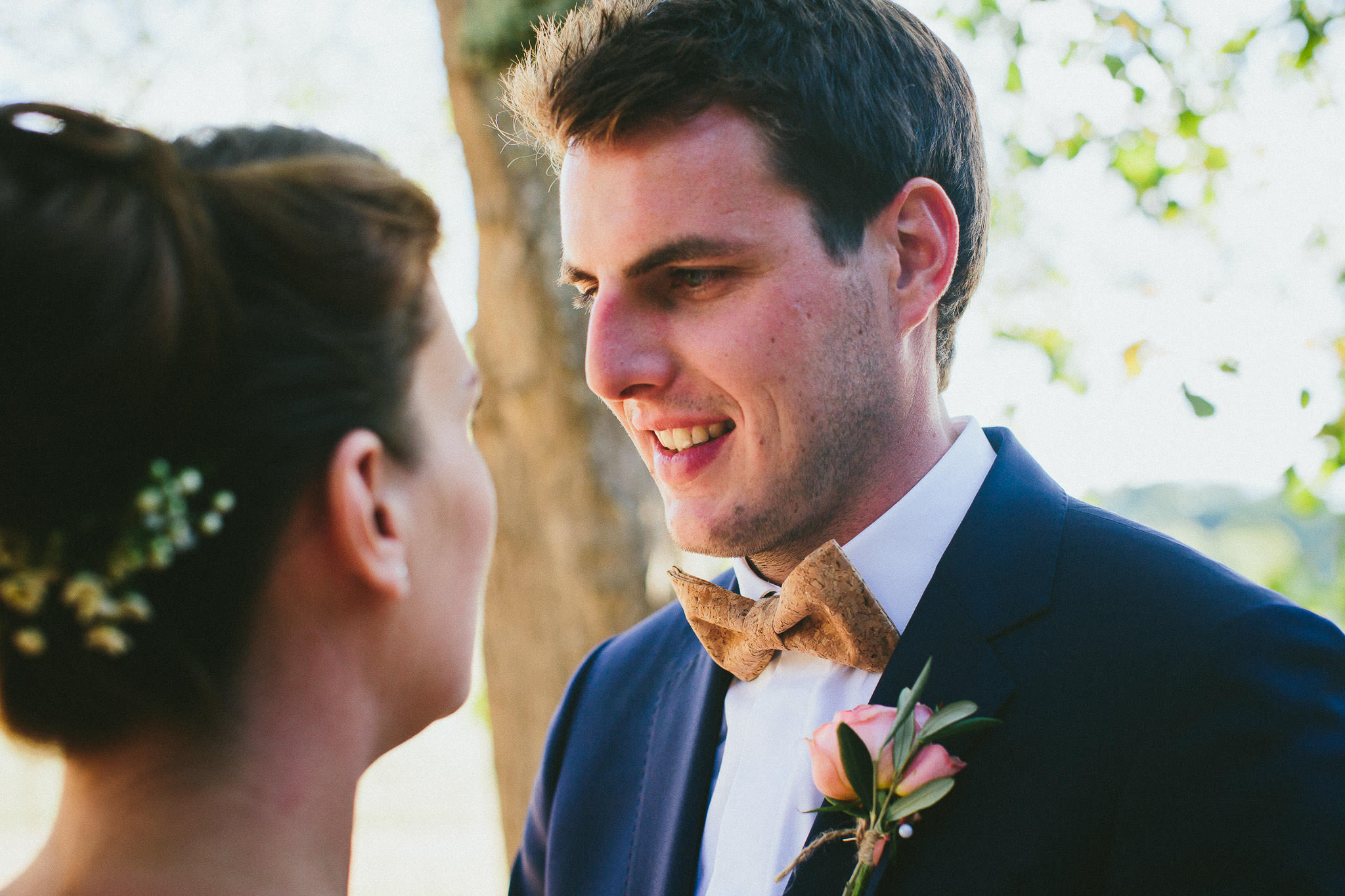 French British wedding photoshoot smiling groom