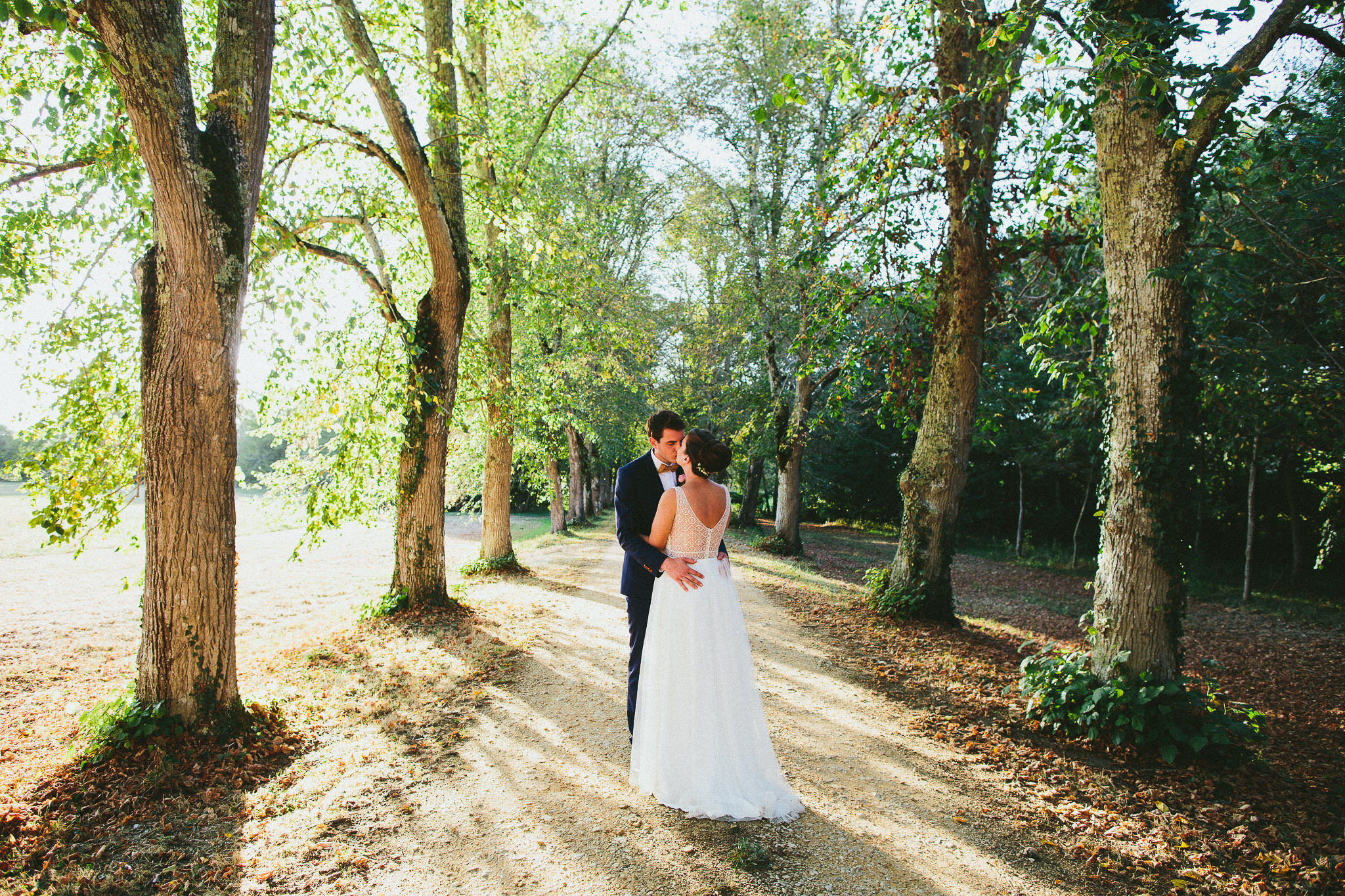 French British wedding photo session sun flare woodlands