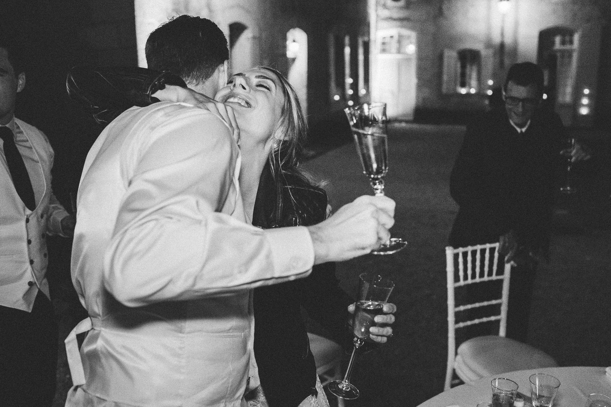 wedding bride hug best man