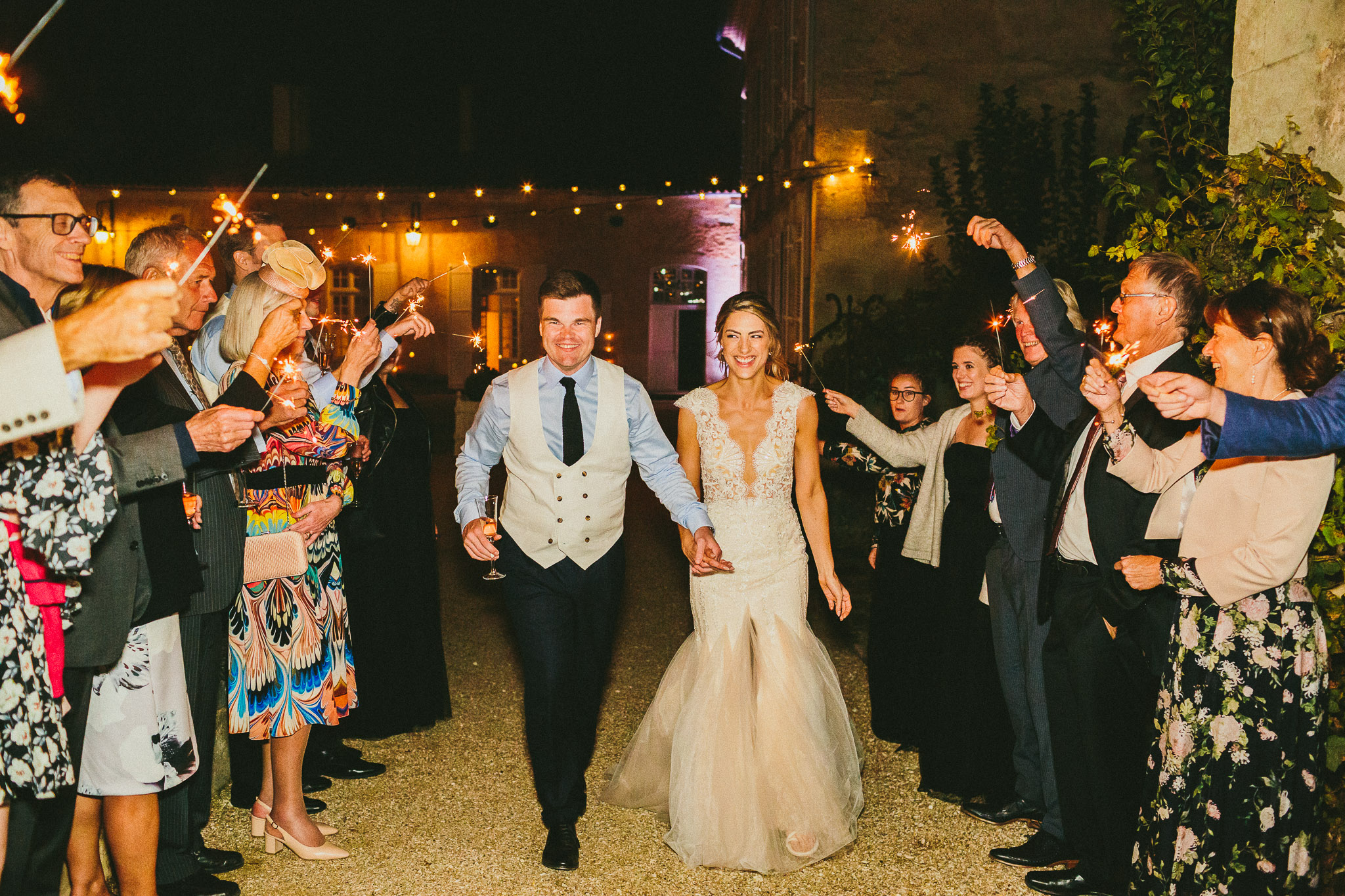 bride and groom sparklers walk