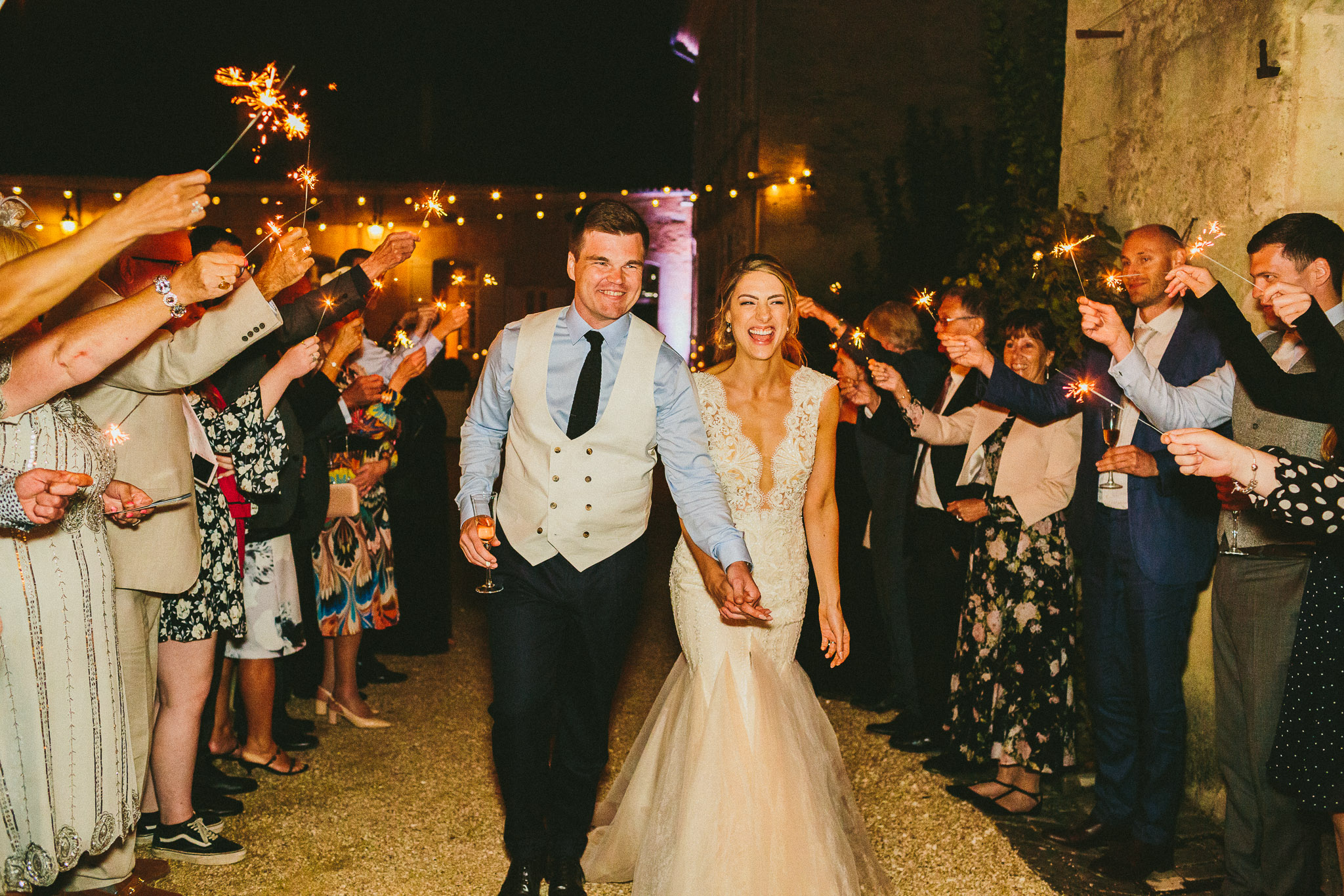 bride and groom sparklers walk and happy