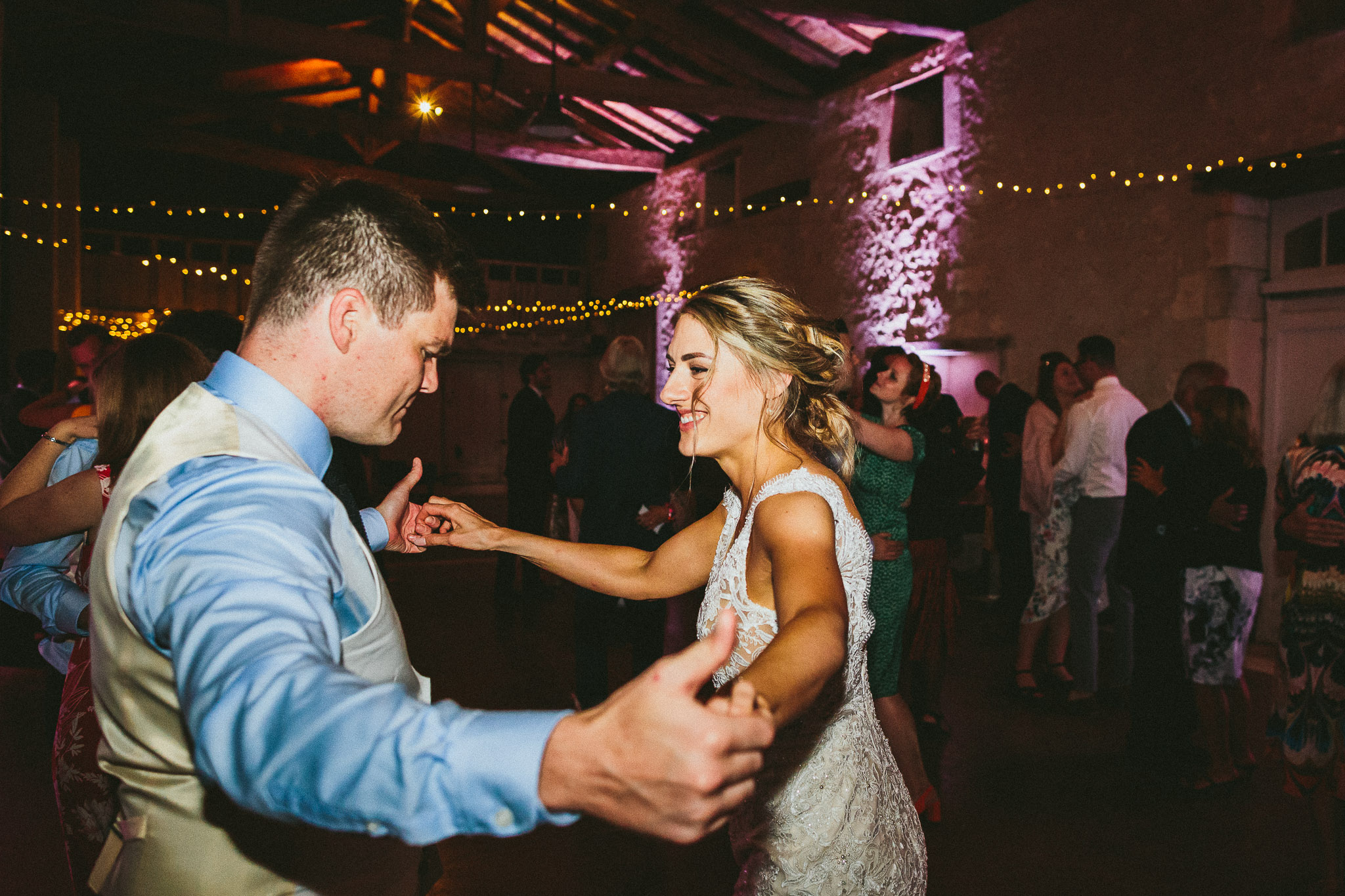 bride and groom dance floor grooving