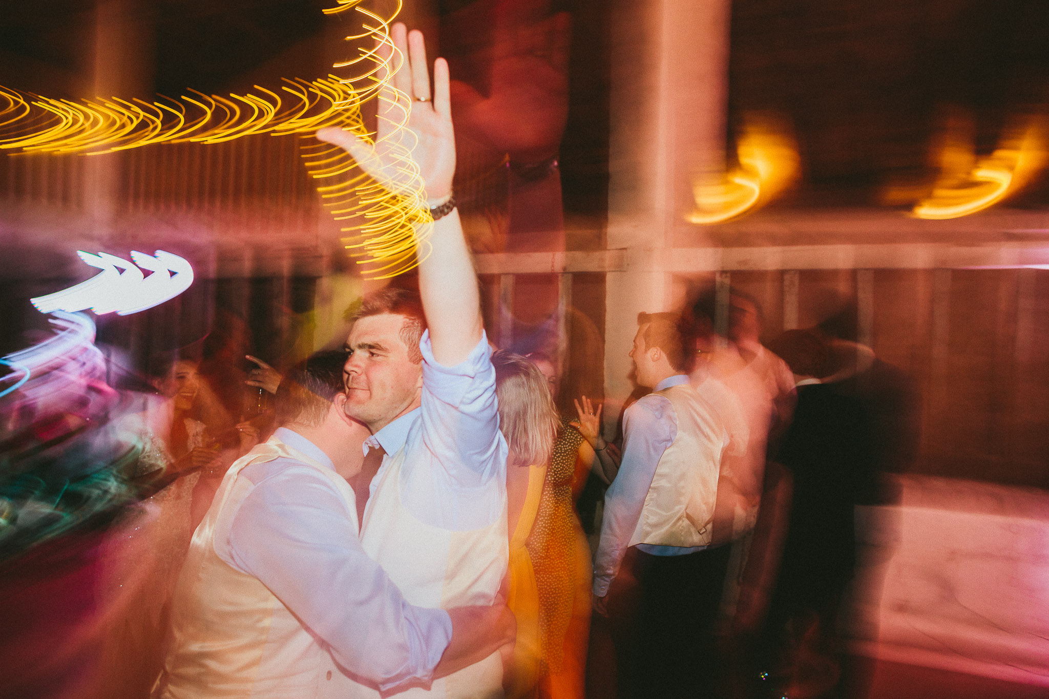 groom and best man dance floor
