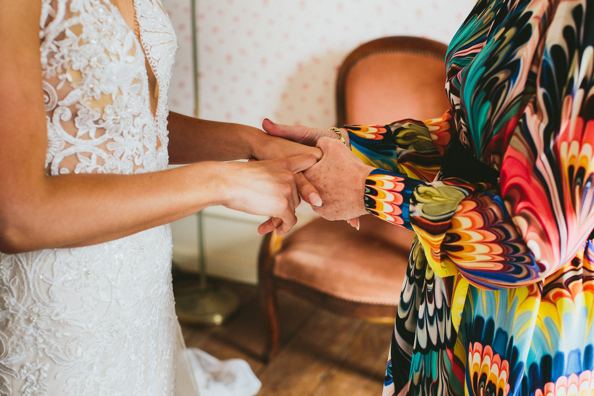bride and mother of the bride hands