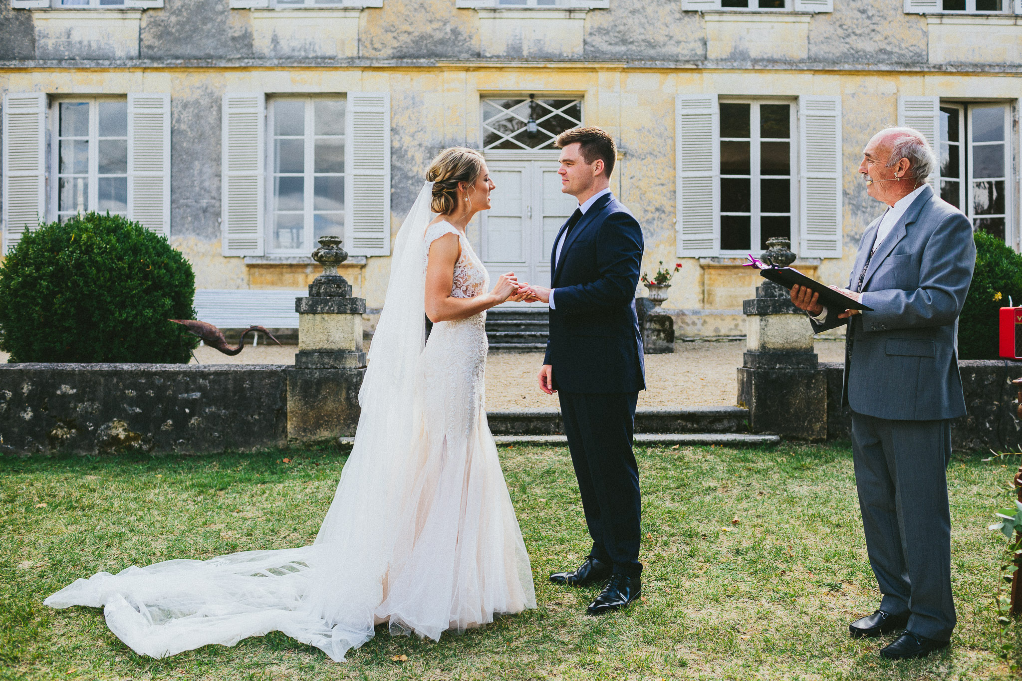 French destination wedding exchange of the rings bride