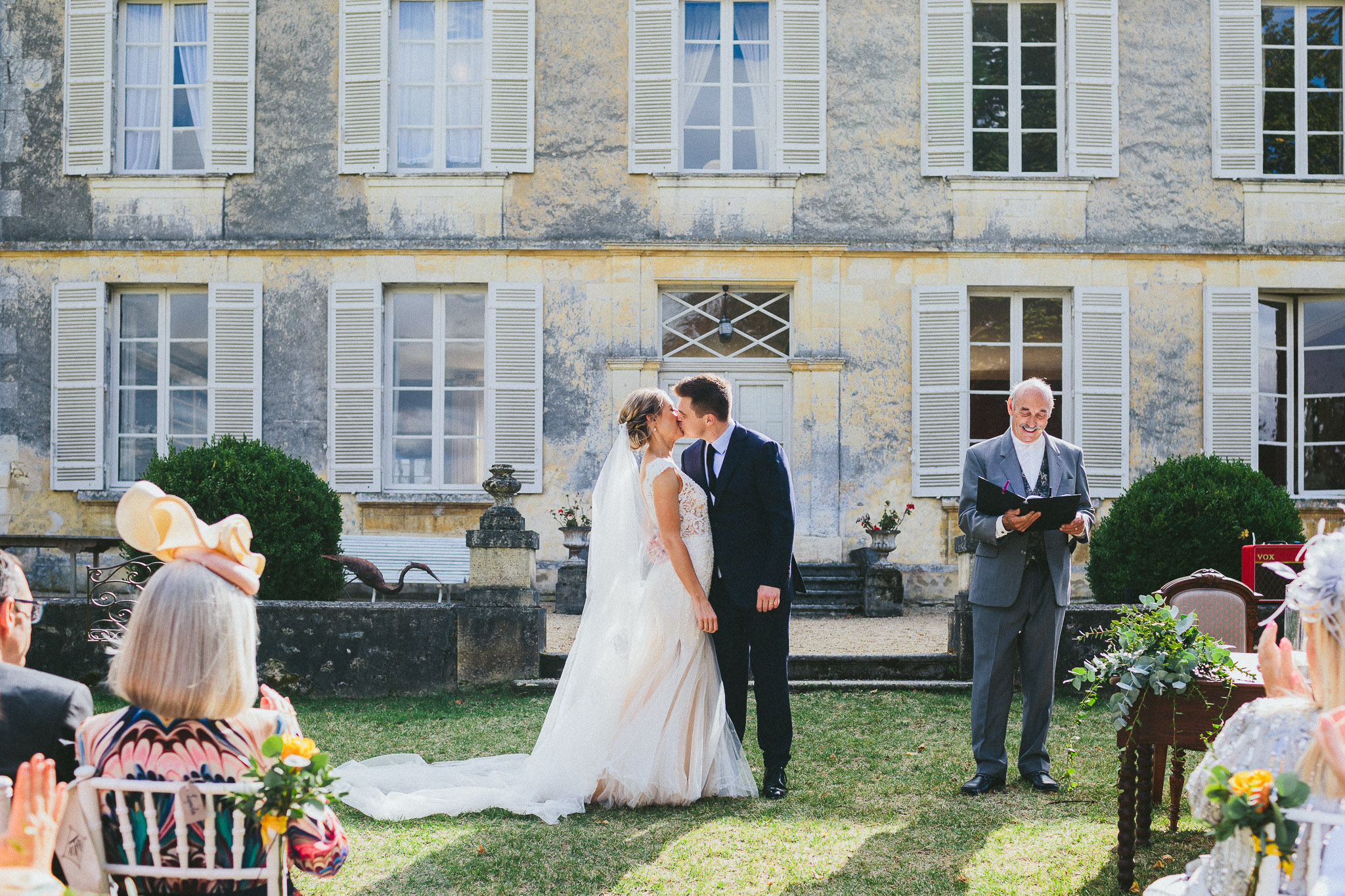 French destination wedding ceremony kiss