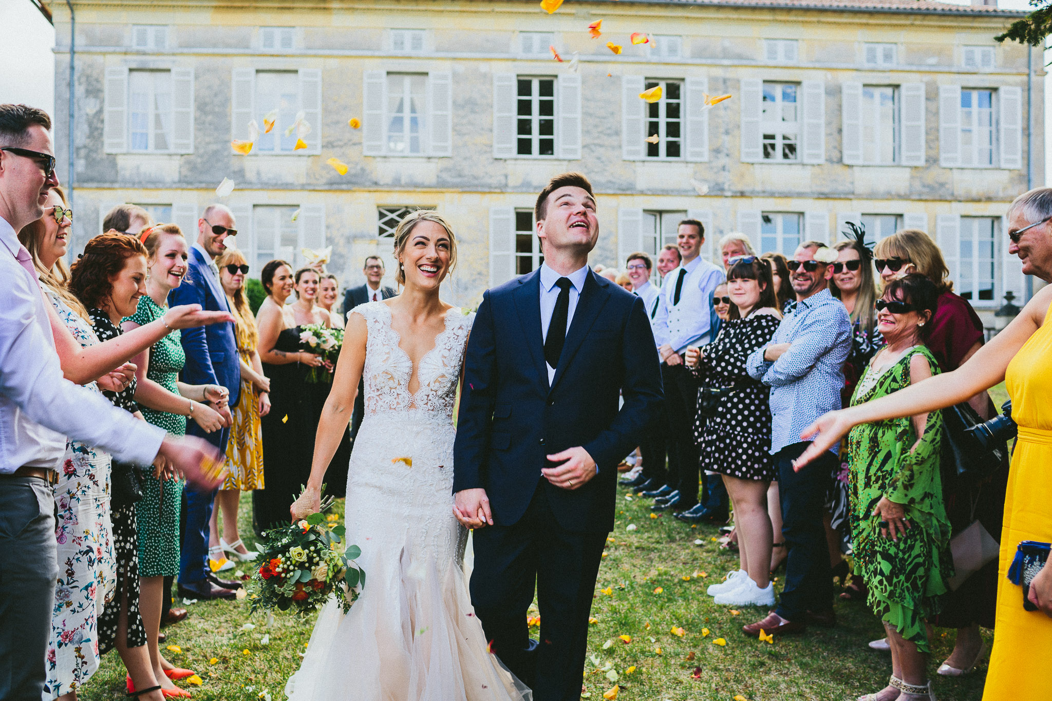 wedding ceremony walking down the aisle throwing of flowers