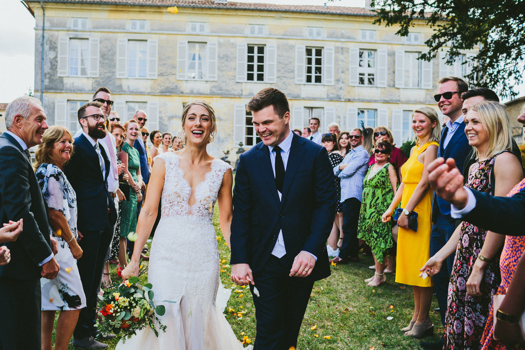 wedding ceremony bride and groom walking down the aisle 
