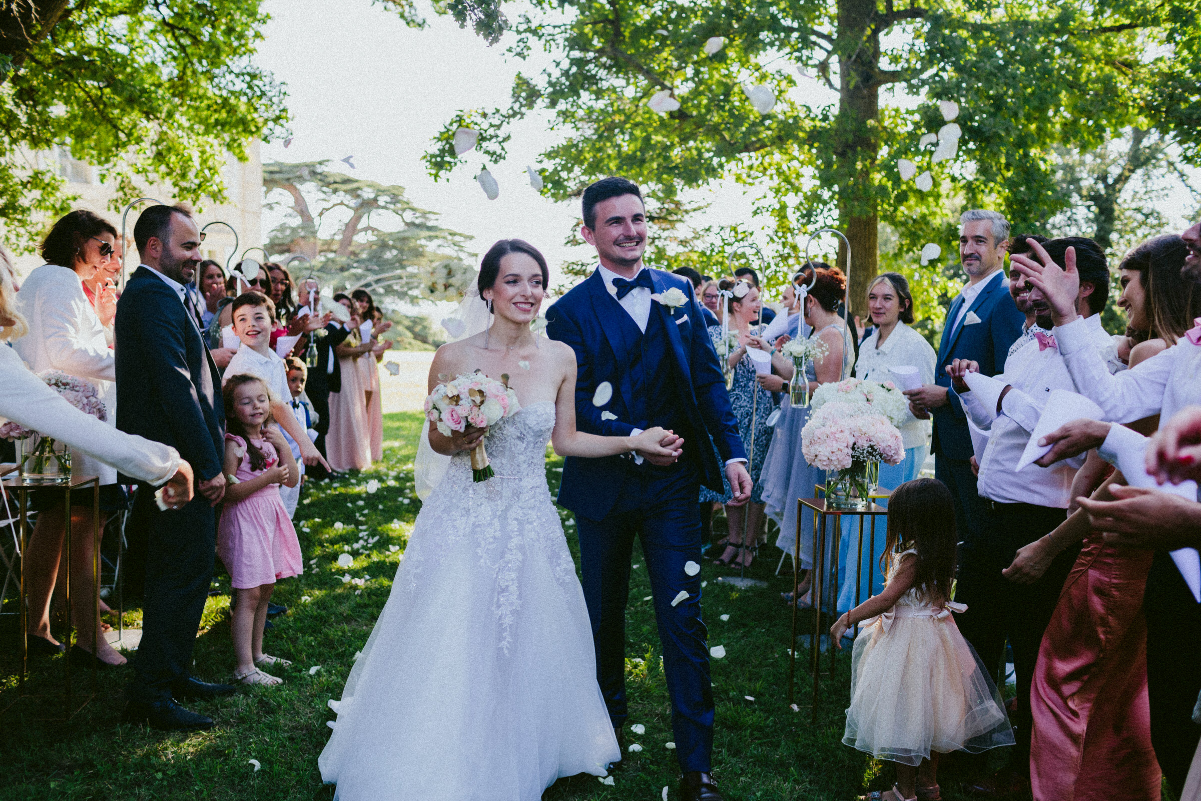 bride and groom walking down the aisle Classy french wedding