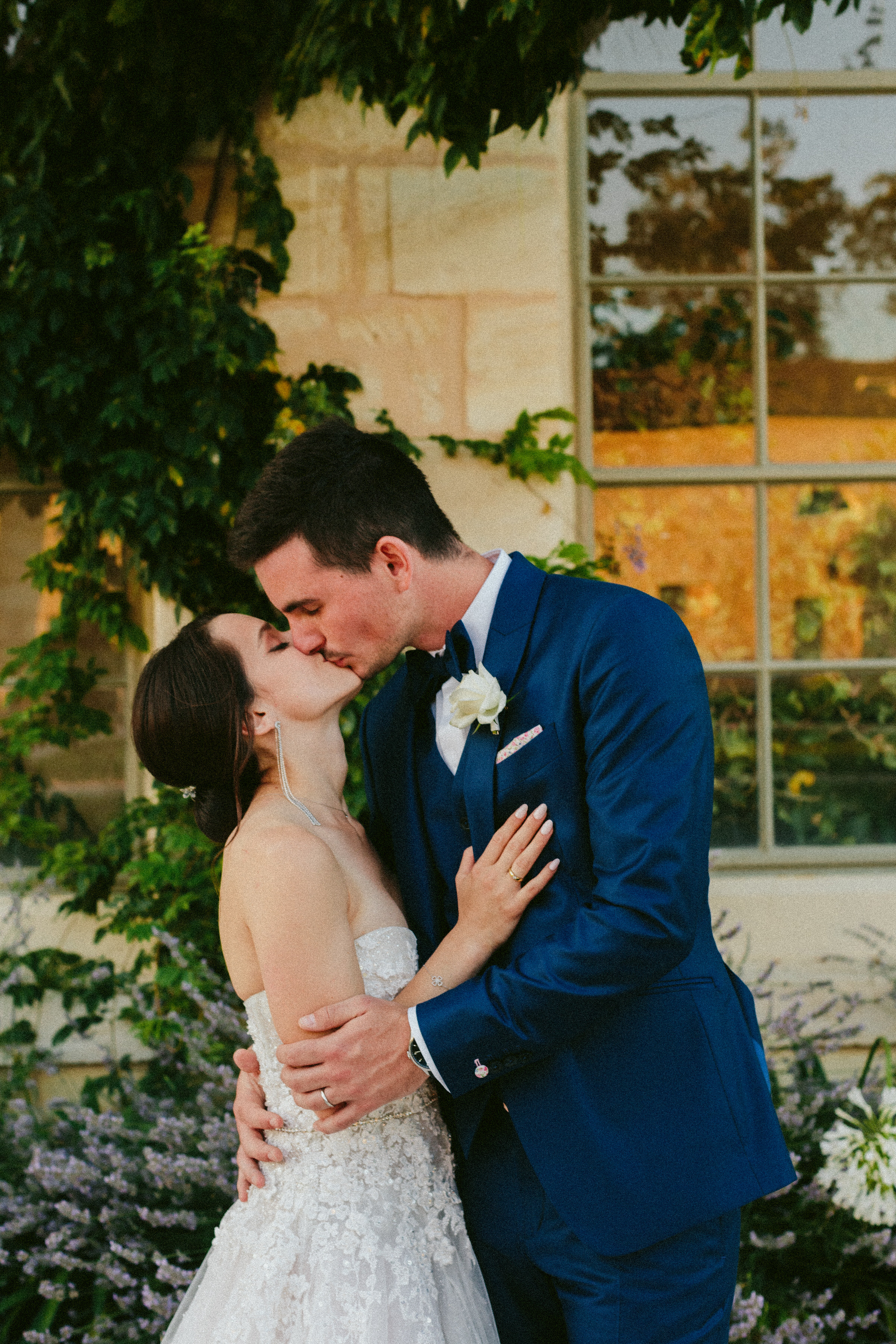 Bride and groom portrait kissing Classy french wedding