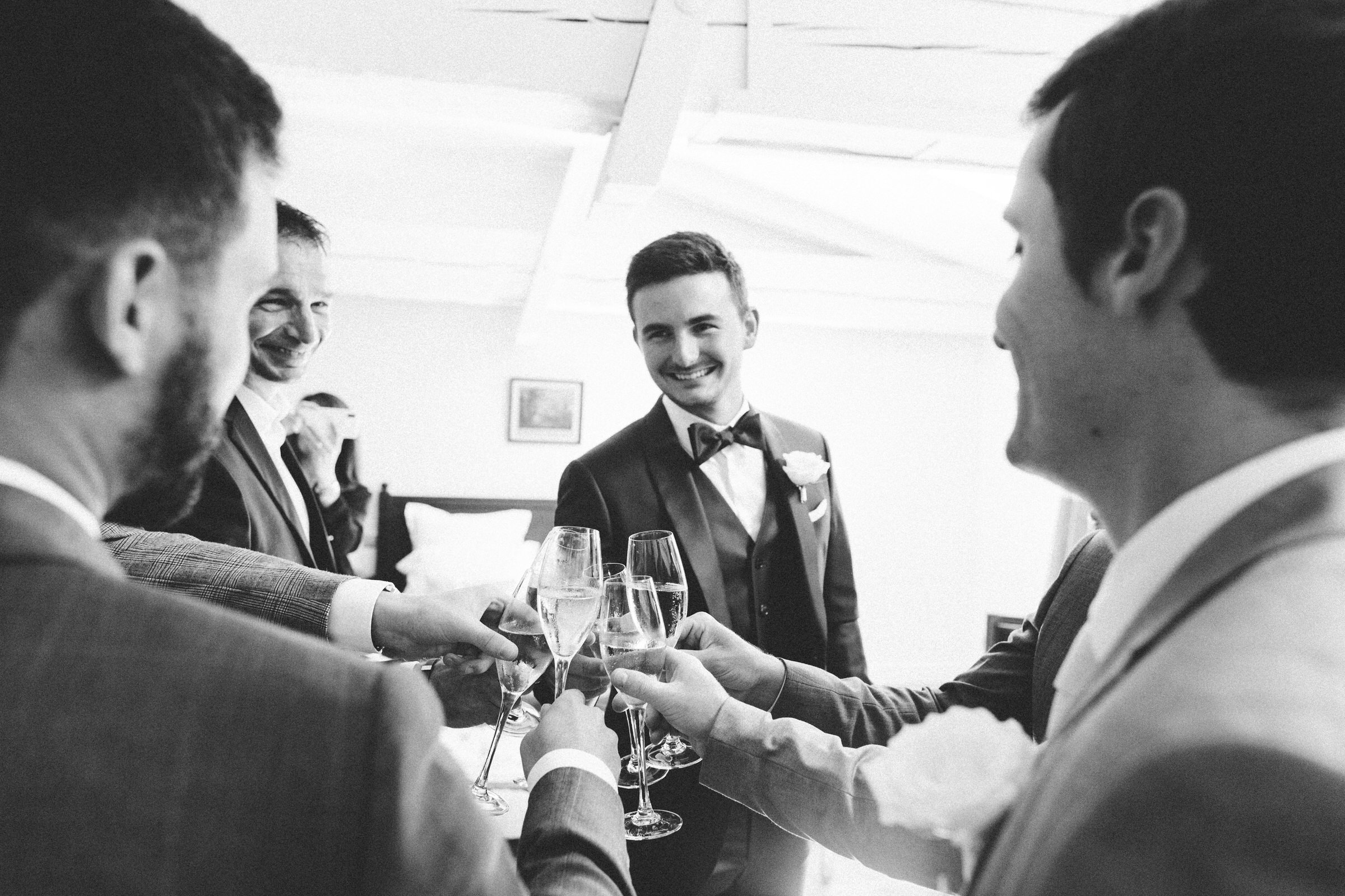 cheers groom and groomsman Classy french wedding