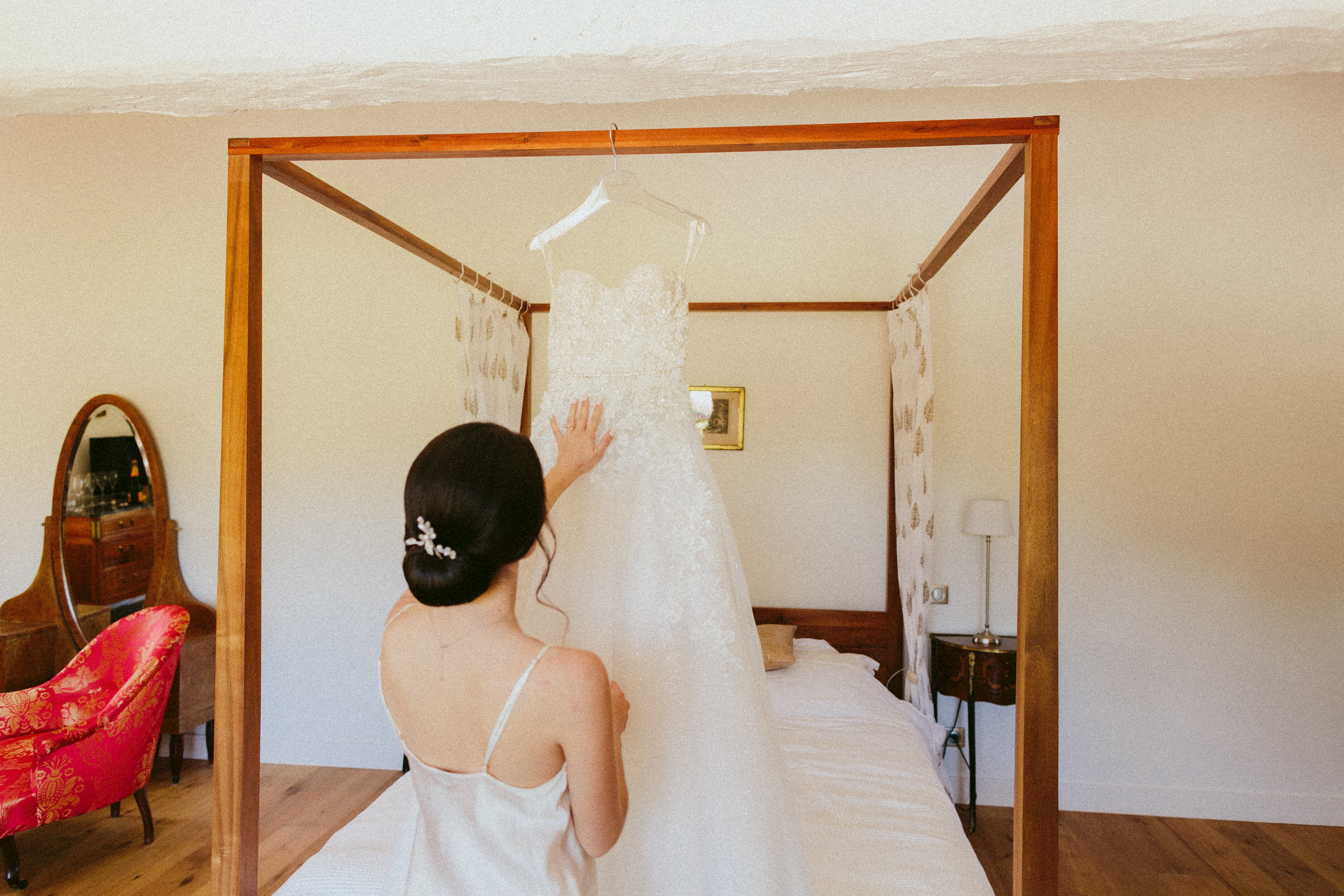 bride looking at her dress Classy french wedding