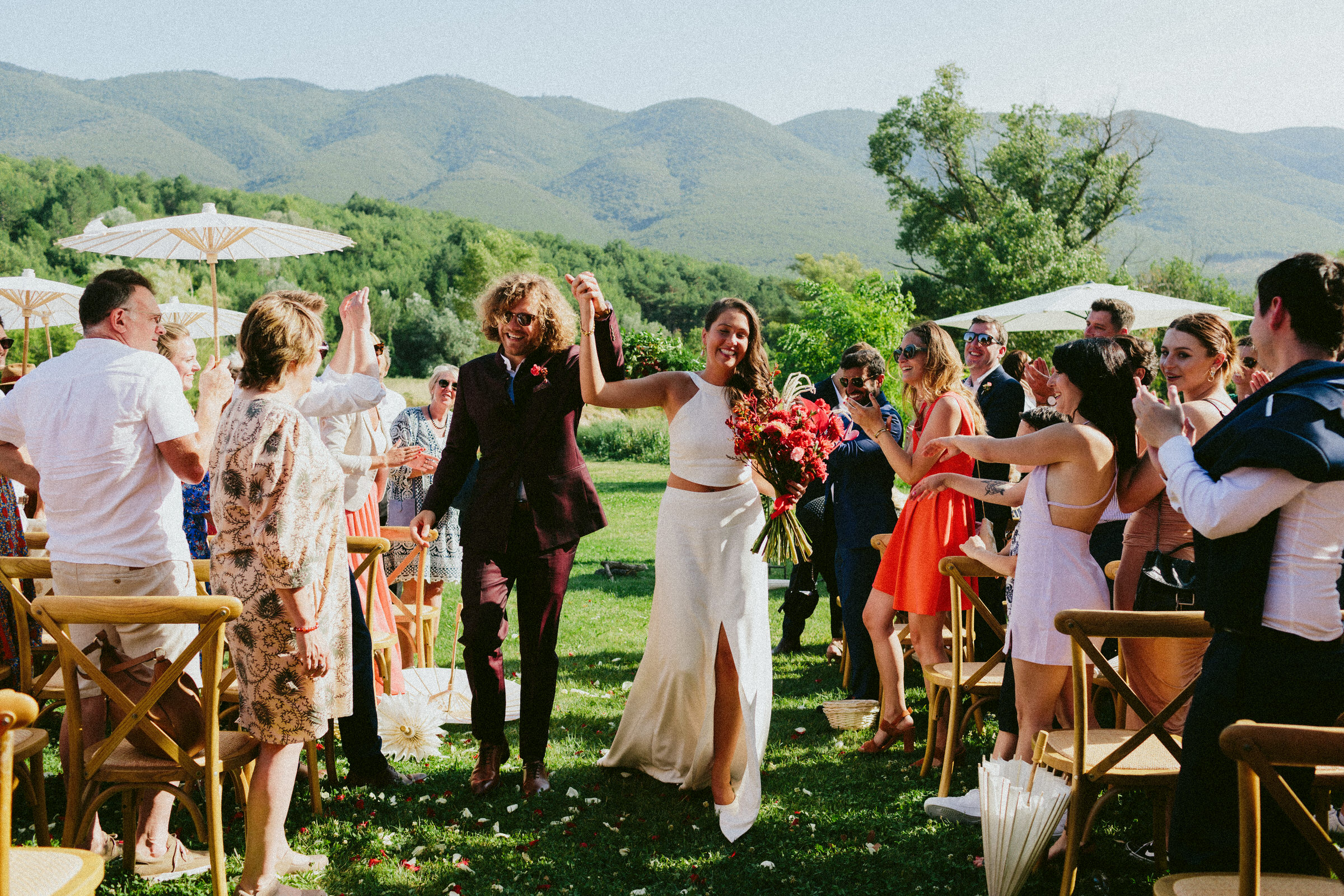 bride and groom walking down aisle Saint-Martin-De-Castillion Wedding France