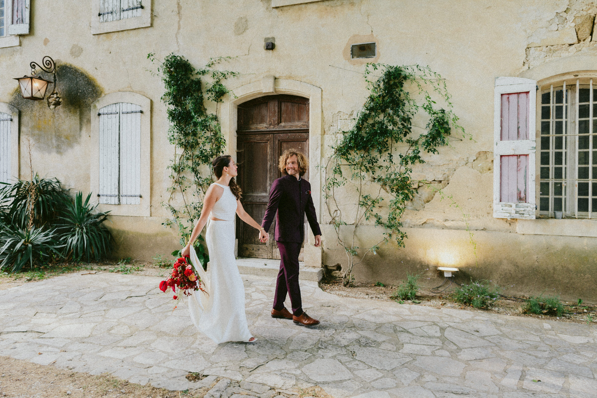 bride and groom walking Saint-Martin-De-Castillion Wedding France
