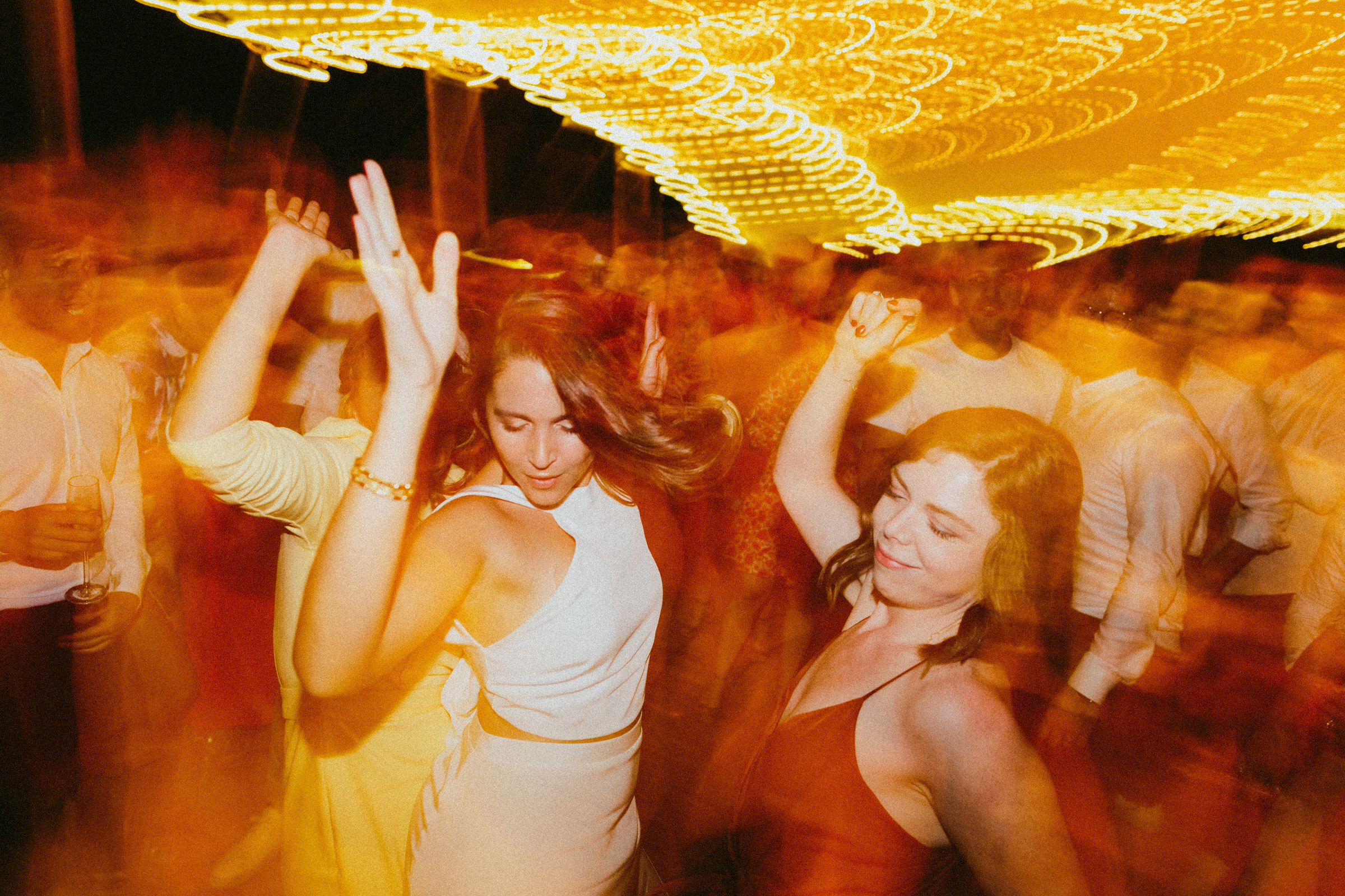 bride and bridesmaid dancing Saint-Martin-De-Castillion Wedding France