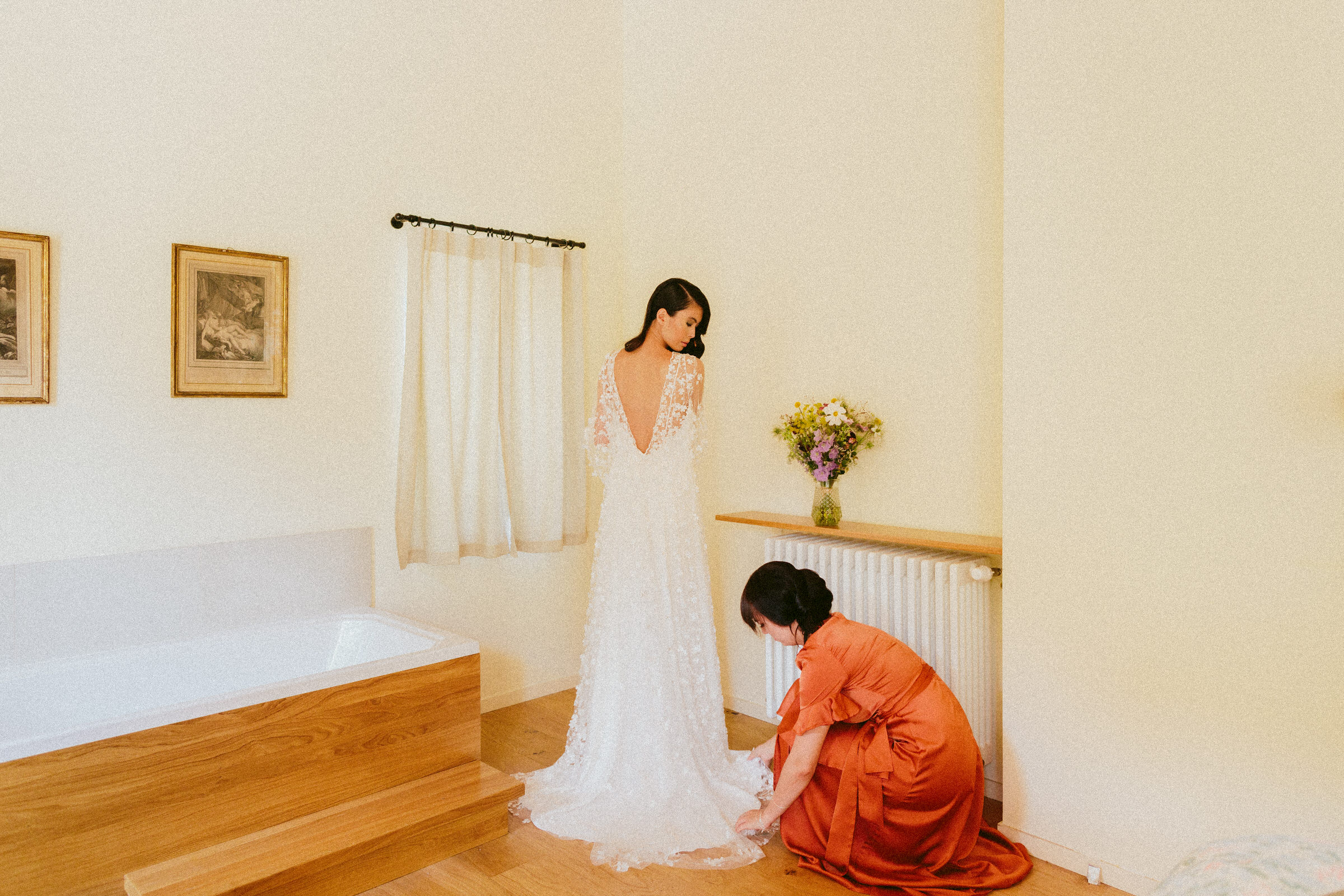 bride and bridesmaid getting ready French Domain Wedding