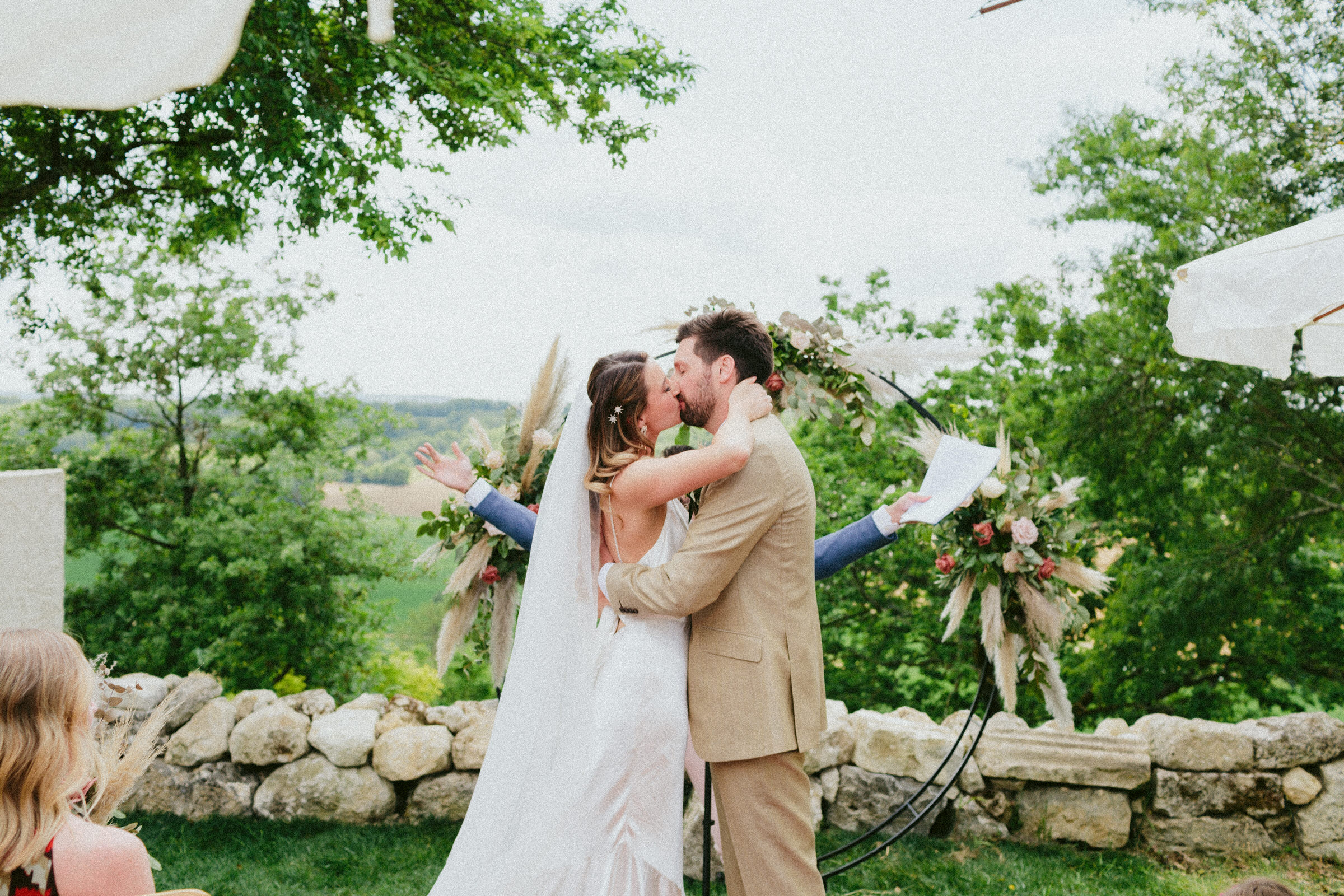 wedding ceremony kiss France Village wedding