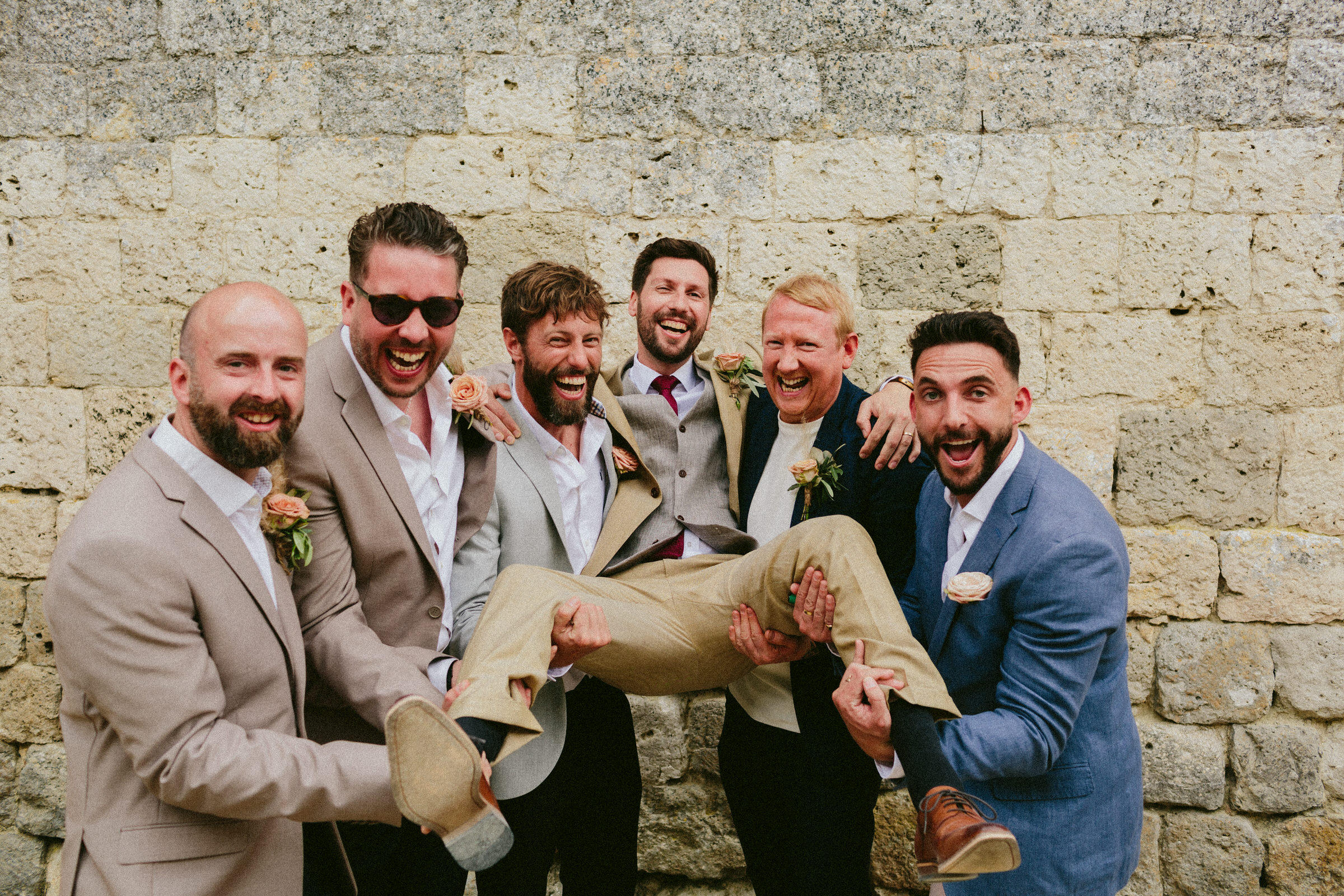 groom and groomsman portrait France Village wedding