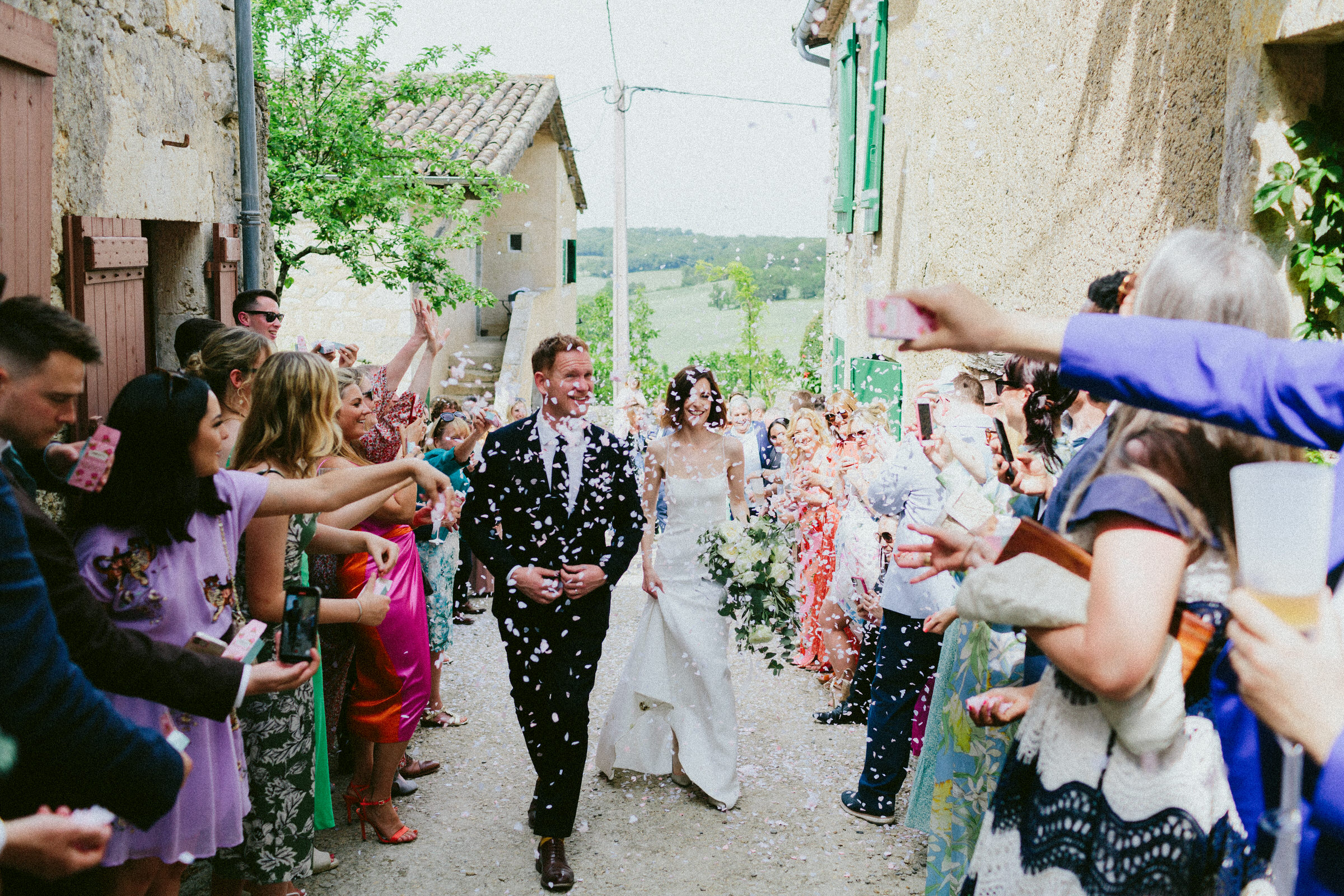 confetti aisle Castelnau des Fieumarcon french village wedding