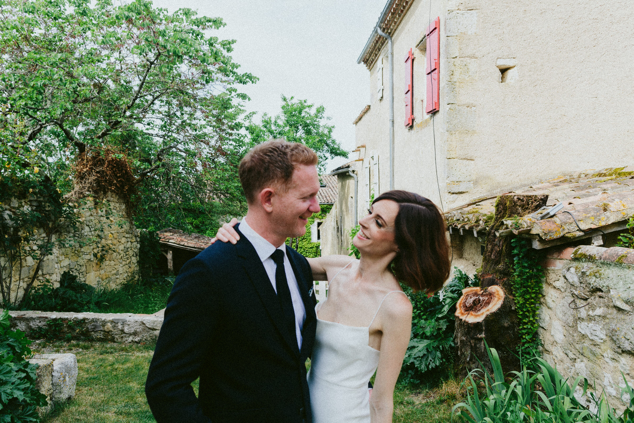smiling bride and groom Castelnau des Fieumarcon french village wedding