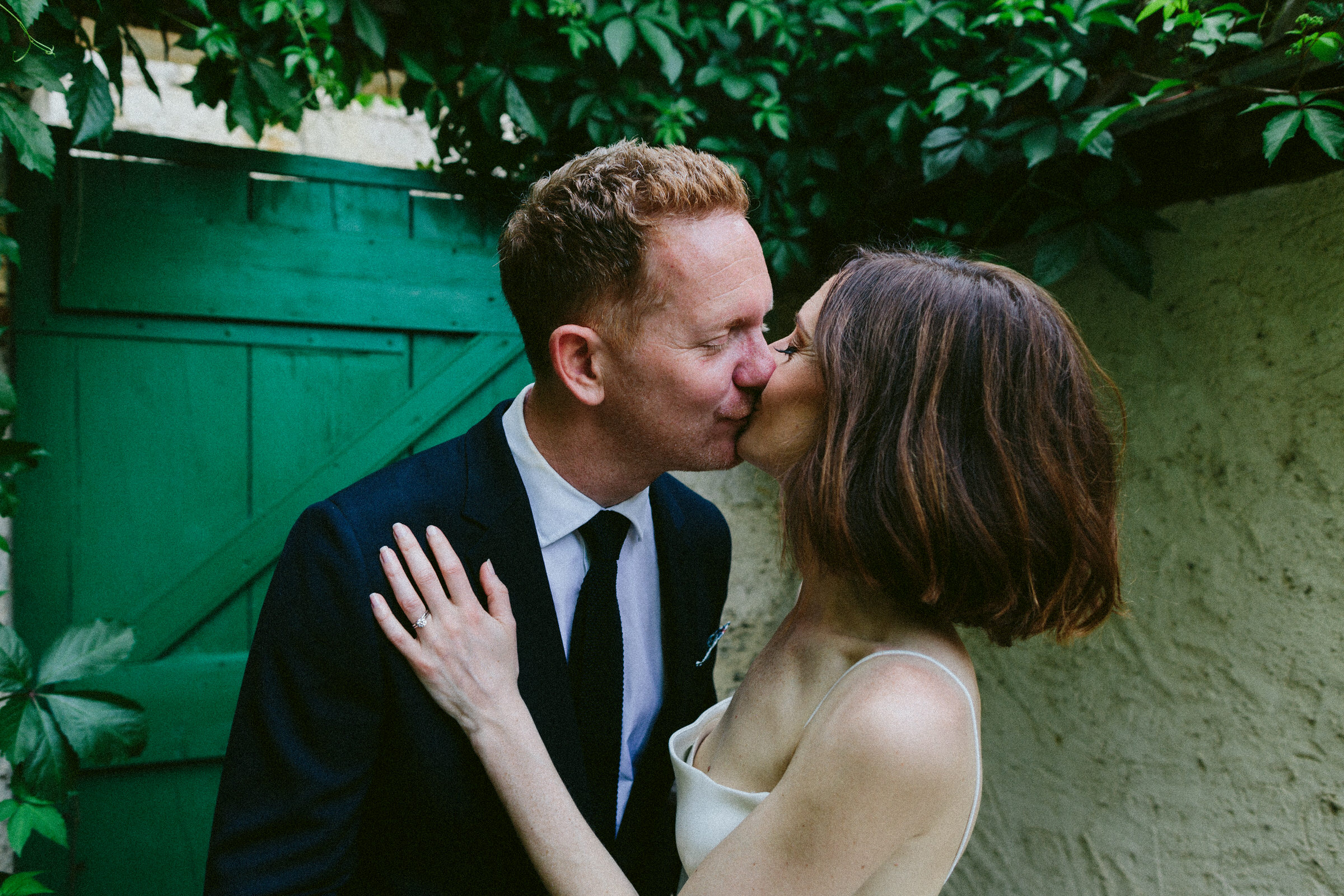bride and groom kissing in France Castelnau des Fieumarcon french village wedding
