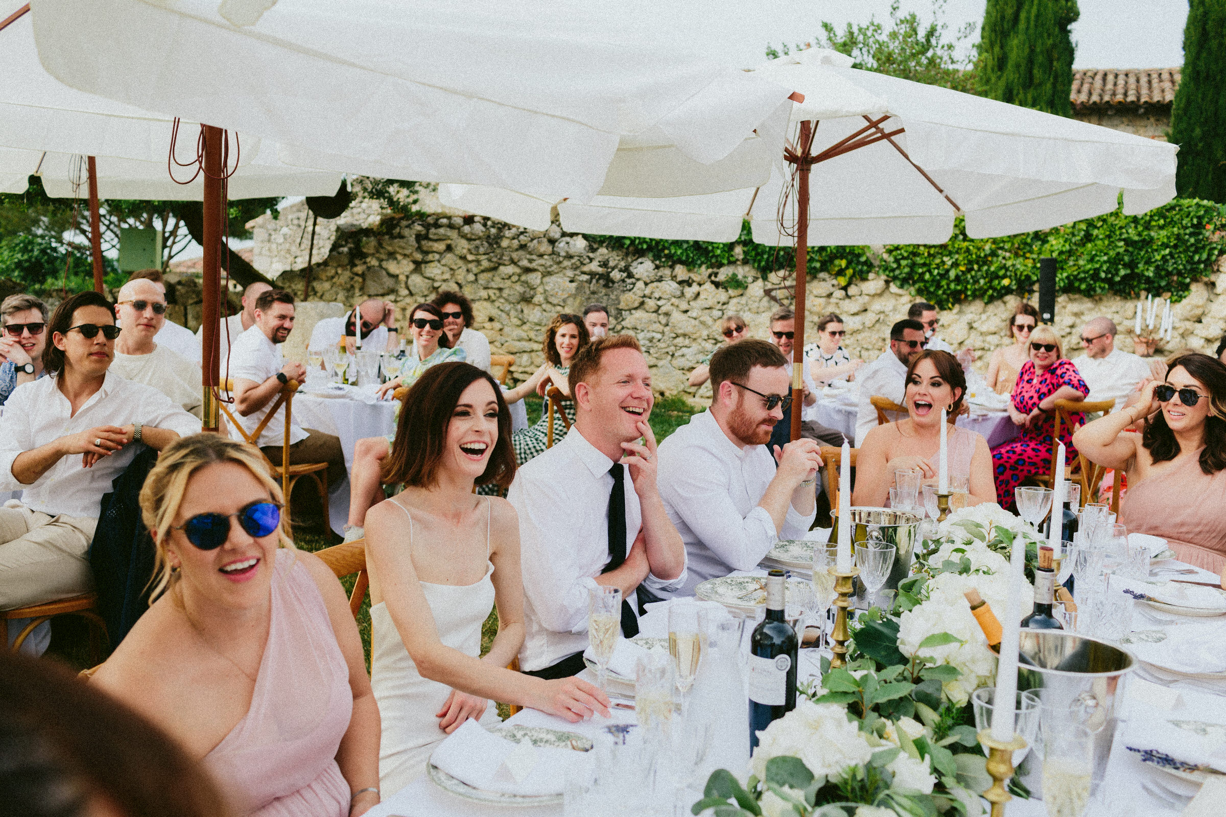 bride and groom react to wedding speech Castelnau des Fieumarcon french village wedding