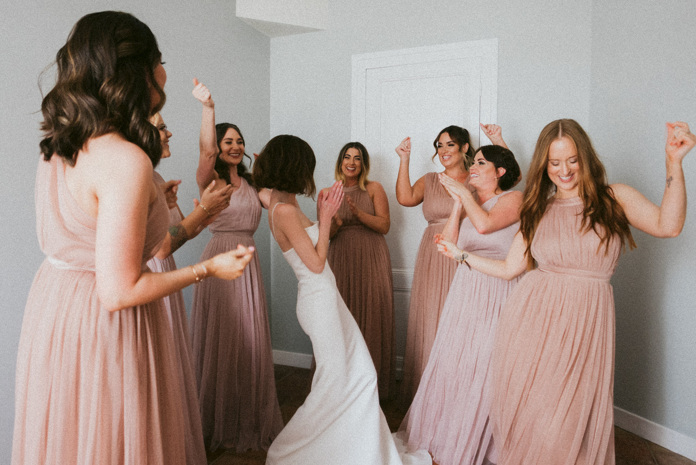 bride and her bridesmaids having fun Castelnau des Fieumarcon french village wedding