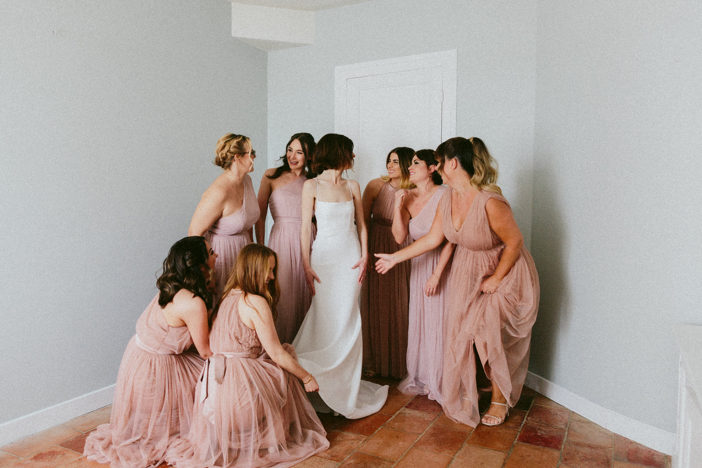 bridesmaid showing love to bride Castelnau des Fieumarcon french village wedding