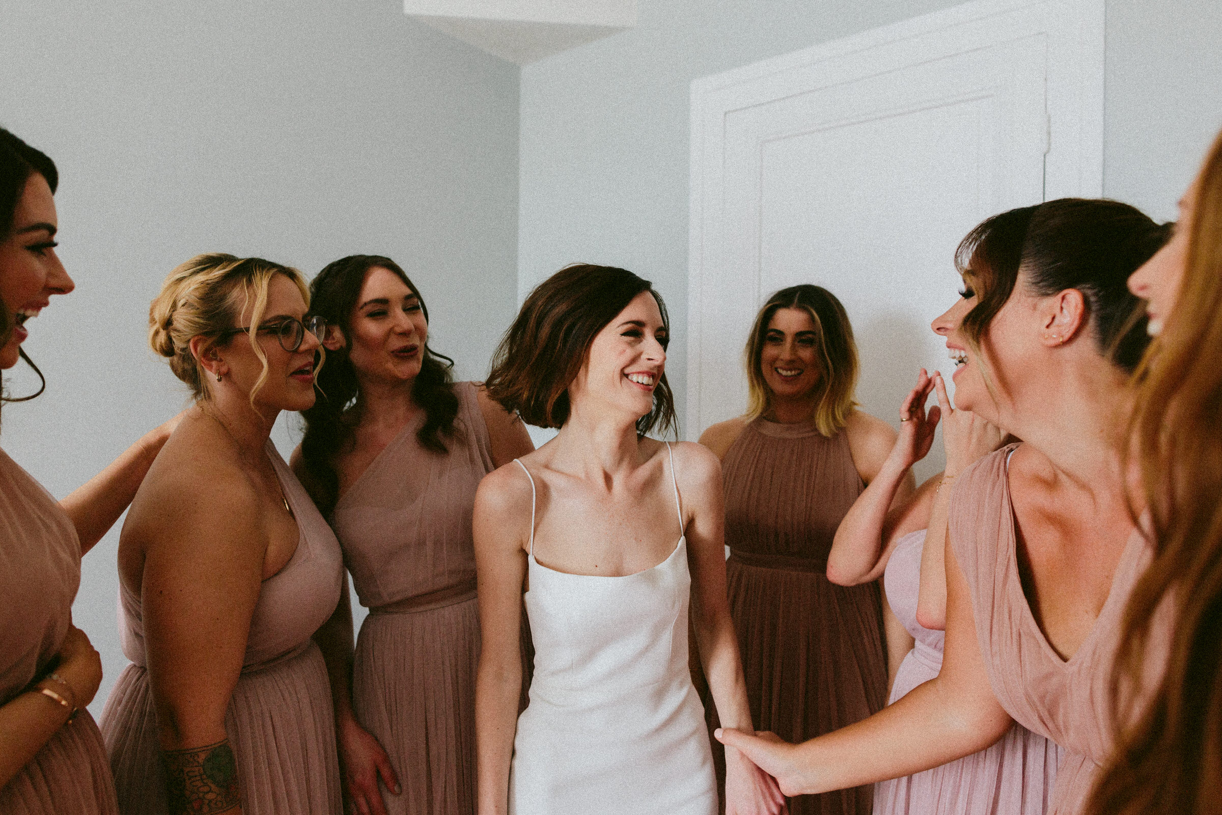 delighted bride with bridesmaids Castelnau des Fieumarcon french village wedding